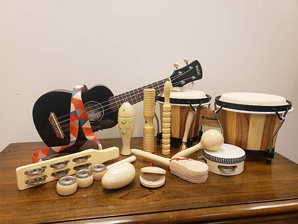 A selection of wooden musical instruments on a table.