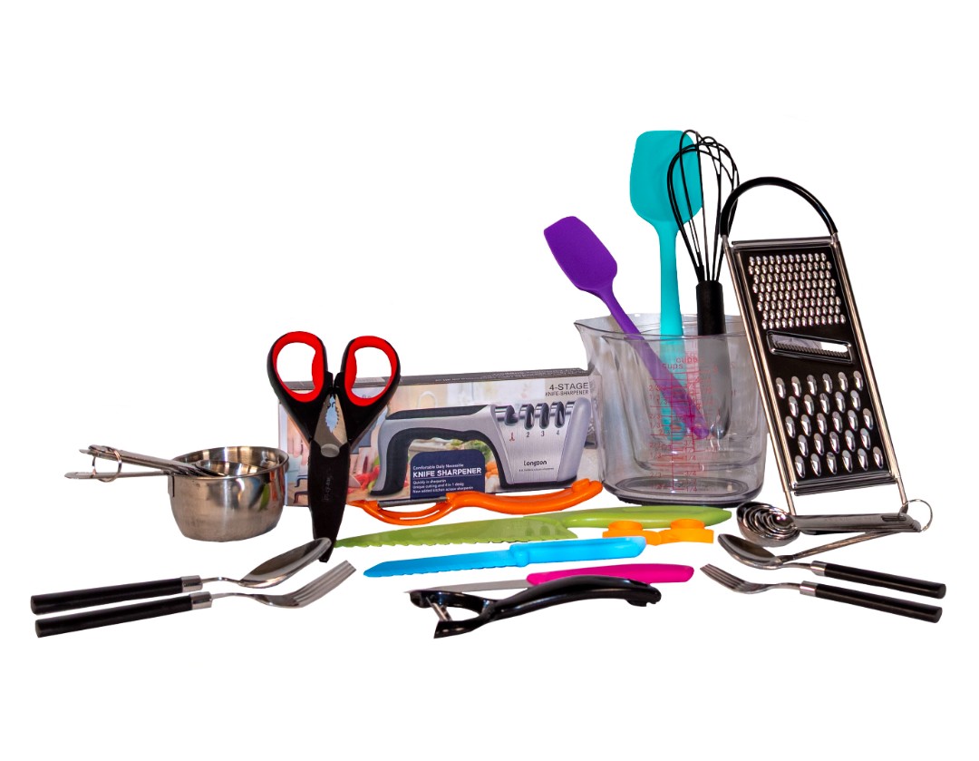A selections of kitchen tools for food prep on a white background.