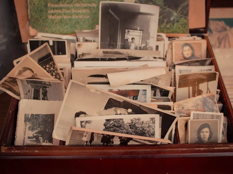 Box of black and white photos.