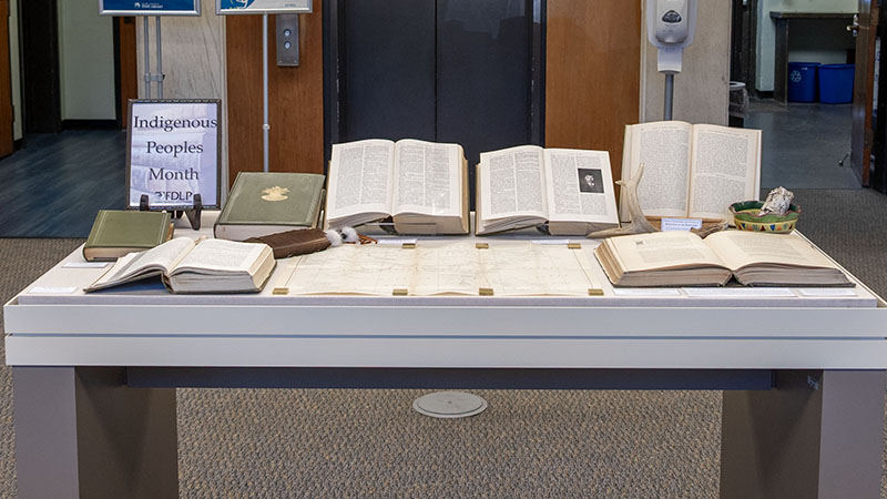 The November display case in the State Library lobby featuring items from the collection for Native American Heritage Month.