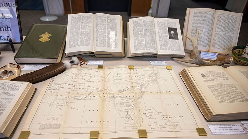 A closer look at the November display case in the State Library lobby featuring items from the collection for Native American Heritage Month.