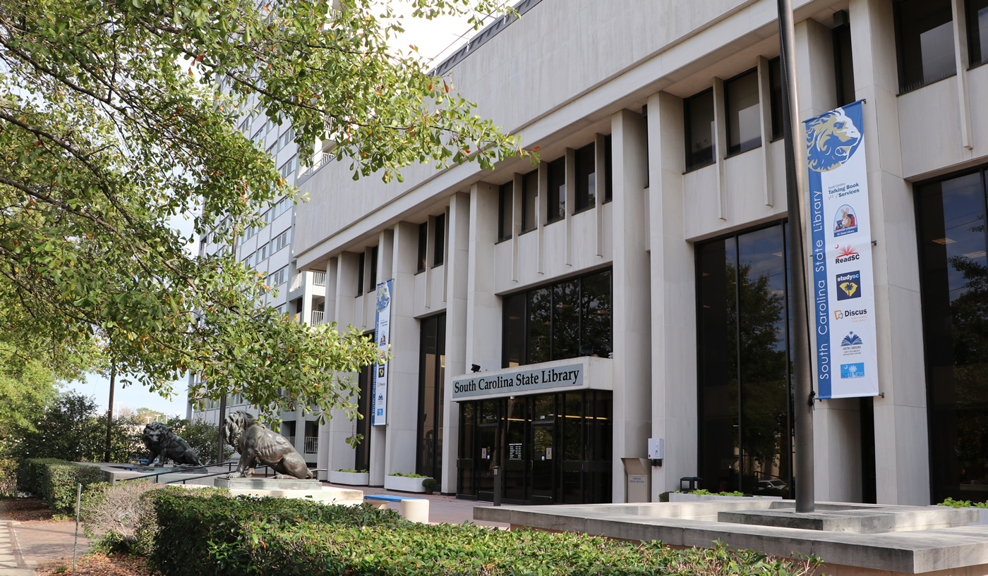 Exterior photo of the library with the lions visible.