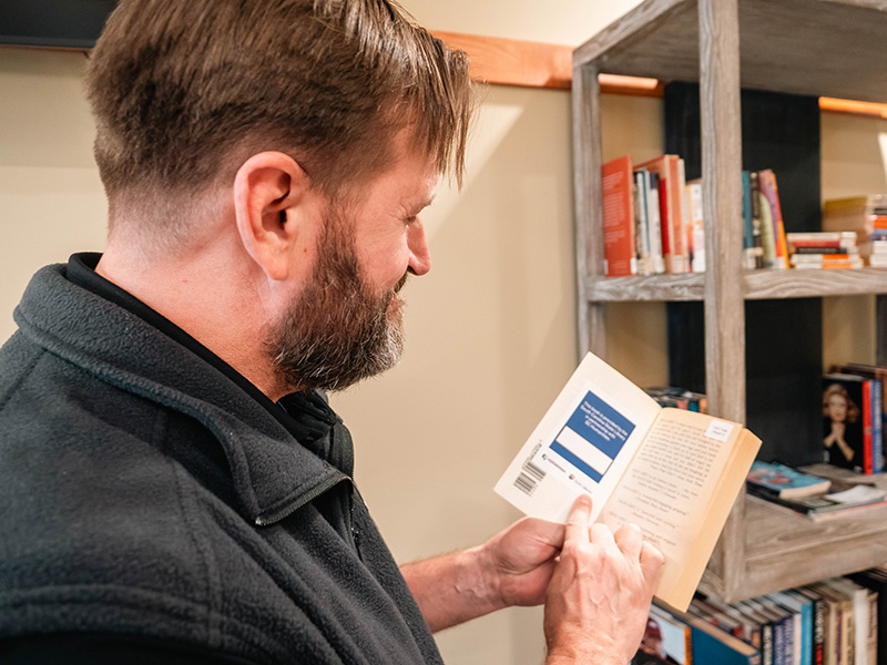 A book with the partnership book plate on the inside cover.