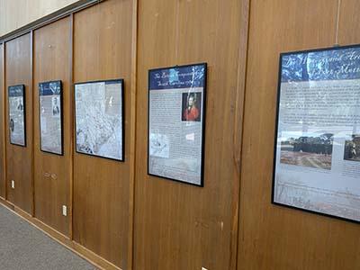 Informative posters on the lobby wall as part of the Fort Motte exhibit.