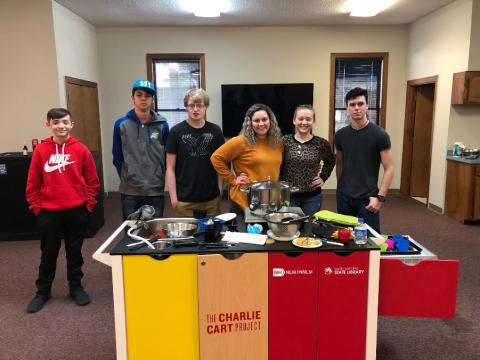 Teens at the Chesterfield County Public Library prepare healthy snacks using the Charlie Cart from the South Carolina State Library