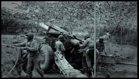 A black and white photo shows the Werenth 11 fighting durimg World War Two. 