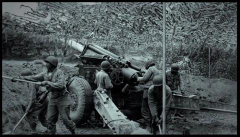 A black and white photo shows the Werenth 11 fighting durimg World War Two. 