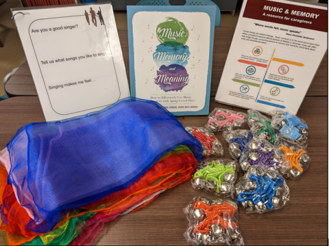 The Music and Memory Dementia Kit contains sensory items and a resource guide.